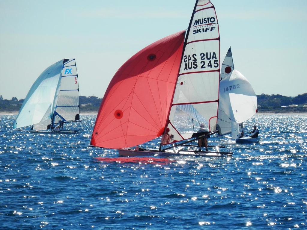 Mandurah sparkled – 49erFX 3 “FIGJAM” (Lauren Dawson & Chelsea Hall) and Musto Skiff AUS245 (Mark Whittington) won their fleets, while sailing legend Gordon Lucas and young local crewman Josh Henshaw (Fireball 14782 “Second Wind”) were  pipped into second place by Jon Emonson and Barry McCartin on “Low Rider”. © Annette Walker